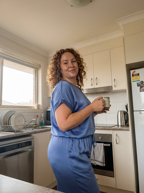 Woman wearing the Shiloh pants set in a kitchen